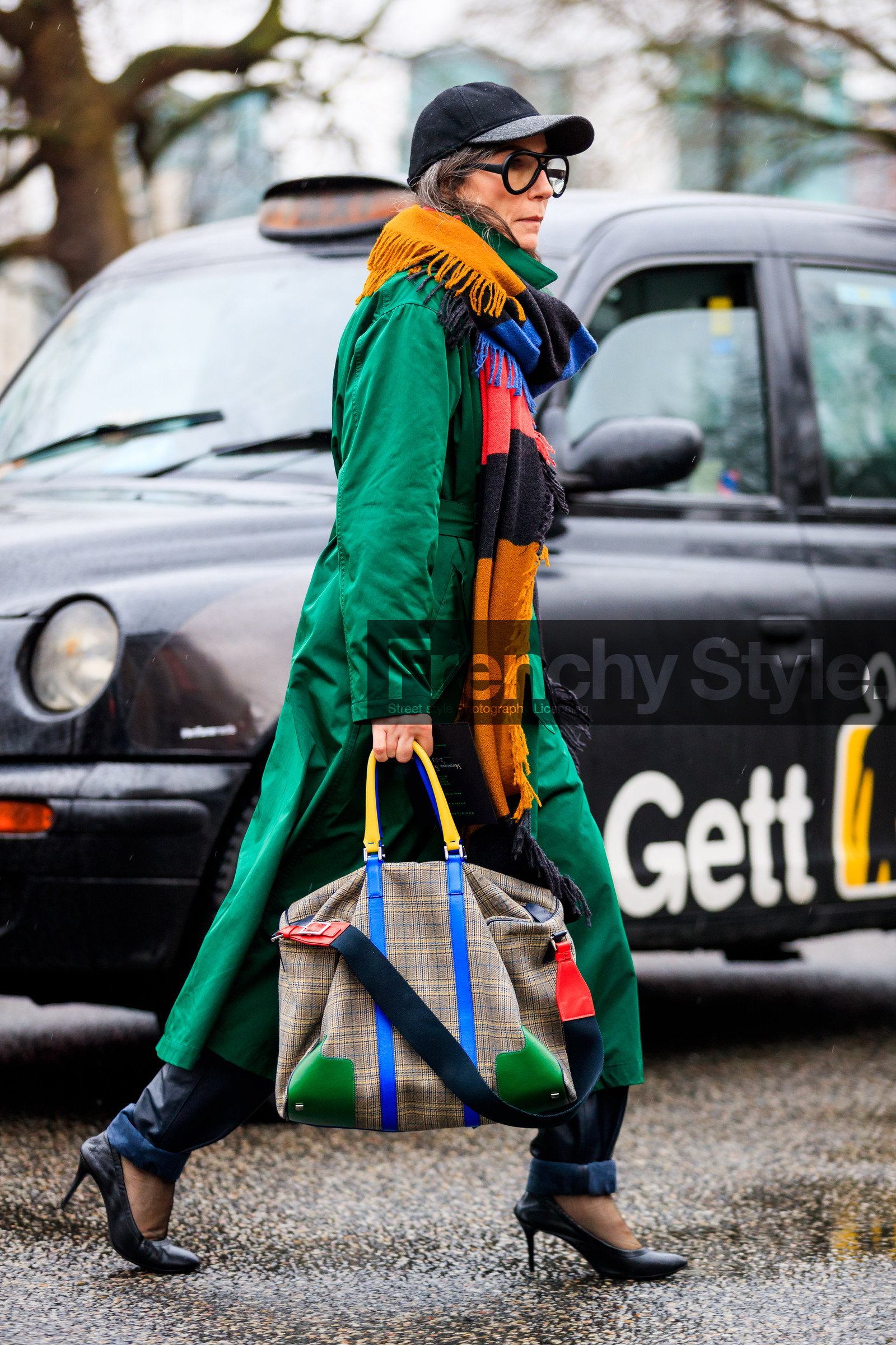 beige bag, black cap, black shoes, graphic bag, green, green coat, high heels, leather bag, leather shoes, orange, printed bag, printed scarf, red, sunglasses, trousers, turquoise, yellow, street style, jonathan paciullo, FW, frenchystyle, fashion week, LFW, LONDON, AUTUMN WINTER 2018-2019, AW 18-19, FALL WINTER 2018-2019, FW 18-19, vertical, full length, Véronique Tristram