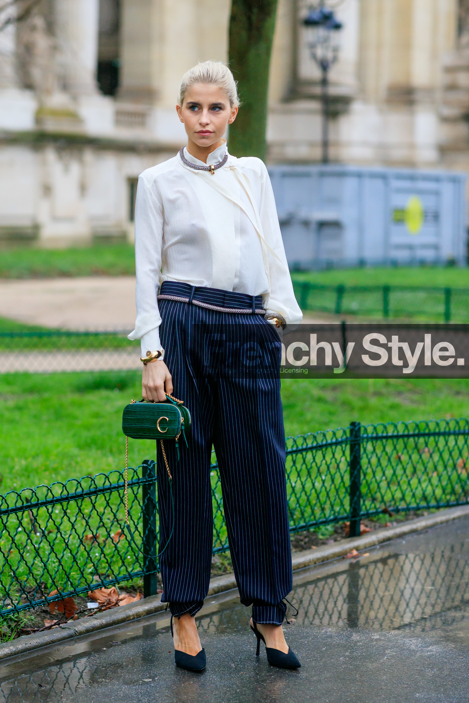 caro daur, white blouse, high collar blouse, lavalliere collar, navy blue pants, striped pants, belted pants, strassed belt, belt jewel, green leather bag, animal skin bag, box bag, chloe bag, chloe belt, chloe blouse, chloe bracelet, chloe look, chloe necklace, chloe pants, strassed necklace, strassed bracelet, golden bracelet, black shoes, sharp end shoes, multi straps shoes, sling back shoes, prada shoes, high heels shoes, fashion week, frenchystyle, FW, jonathan paciullo, street style, PFW, PARIS, AUTUMN WINTER 2020-2021, FALL WINTER 2020-2021, FW 20-21, vertical, full length