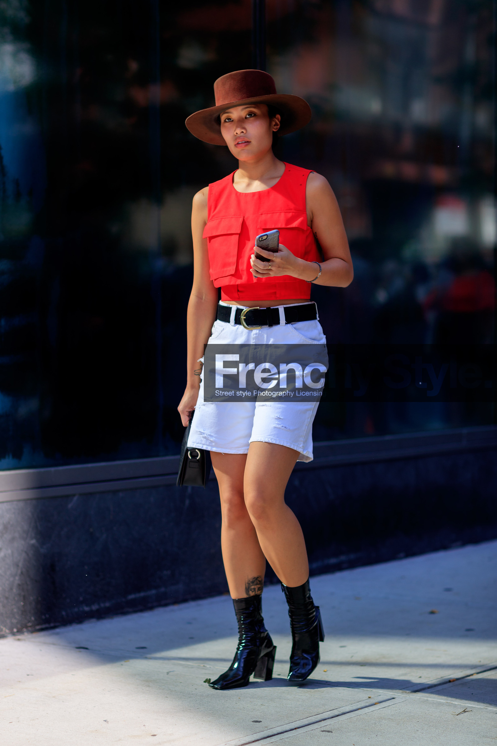 black belt, black shoes, brown hat, denim shorts, fashion week, frenchystyle, full length, FW, high heels, iphone, jonathan paciullo, leather belt, leather shoes, NEW YORK, NYFW, red top, SPRING SUMMER 2018, SS 18, street style, vertical, white denim