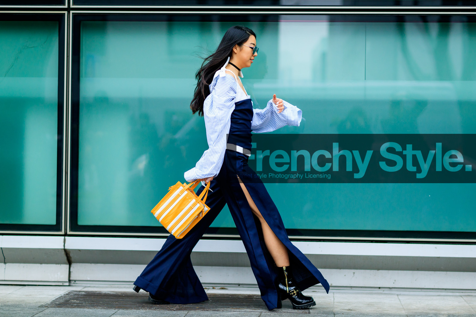 atmosphere details, AUTUMN WINTER 2017-2018, AW 17-18, balenciaga, black boots, black shoes, blue shirt, bustier top, choker, FALL WINTER 2017-2018, fashion week, frenchystyle, full length, FW, FW 17-18, graphic bag, horizontal, jonathan paciullo, leather bag, leather shoes, MFW, MILAN, navy pants, necklace, off the shoulder, printed bag, street style, striped bag, sunglasses, trousers, wide pants, yellow bag
