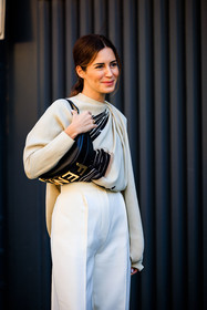 fendi handbag, black handbag, leather handbag, fendi black bag, white trousers, highwaist pants, burgundy shoes, cream pleated top, minimal look, printed top, close up, gala gonzalez, fashion week, frenchystyle, FW, jonathan paciullo, street style, MFW, MILAN, FALL WINTER 2022_2023, AUTUMN WINTER 2022-2023, FW 22-23, vertical, atmosphere details