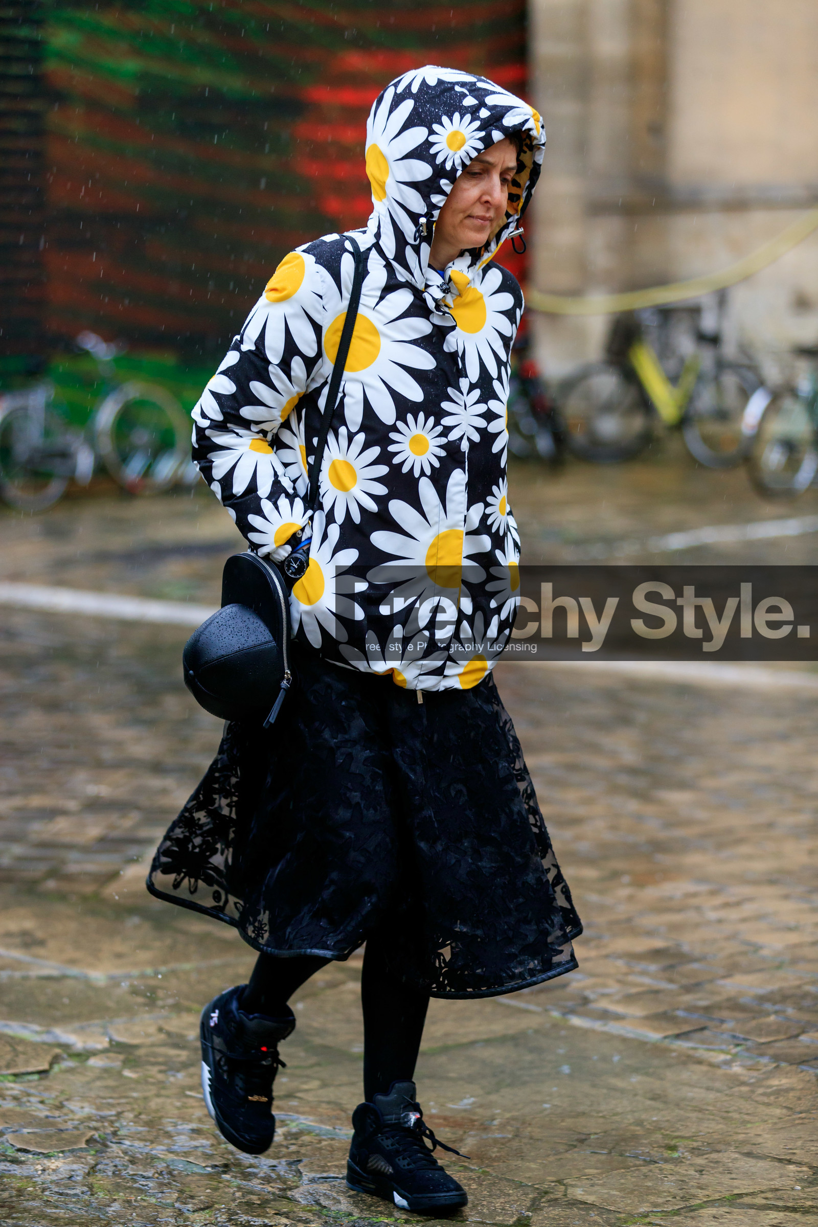 sarah lerfel, black coat, black leather bag, black skirt, black tights, black sneackers, white coat, yellow coat, floral printed coat, round shape bag, shoulder bag, j w anderson bag, rolex watch, black watch, lace skirt, nike shoes, fashion week, frenchystyle, FW, jonathan paciullo, street style, PFW, PARIS, vertical, full length