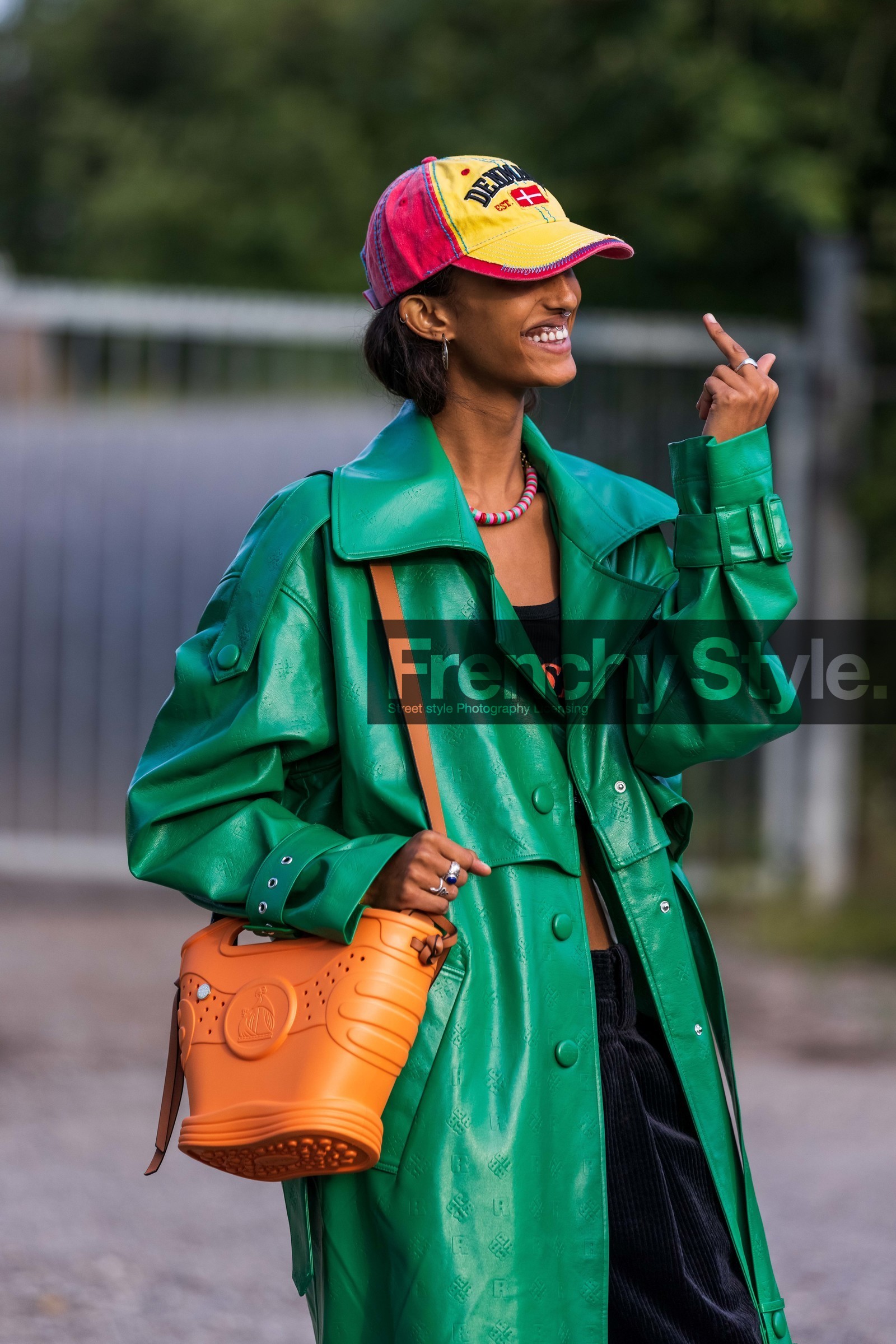 bag, black pants, cap, coat, color, green coat, lanvin bag, leather coat, necklace, orange bag, printed cap, printed coat, red cap, yellow cap, Mona Tougaard, fashion week, frenchystyle, FW, jonathan paciullo, street style, CPHFW, COPENHAGEN, SS 22, SPRING SUMMER 2022, vertical, atmosphere details