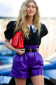 emili sindlev, purple leather shorts, high waist shorts, black shirt, balloon sleeves, black leather belt, red leather clutch, miu miu shorts, miu miu shirt, short sleeves shirt, balenciaga bag, quilted bag, big collar, floral embroidered collar, fashion week, frenchystyle, FW, jonathan paciullo, street style, MFW, MILAN, AUTUMN WINTER 2020-2021, FALL WINTER 2020-2021, FW 20-21, vertical, atmosphere details, detail