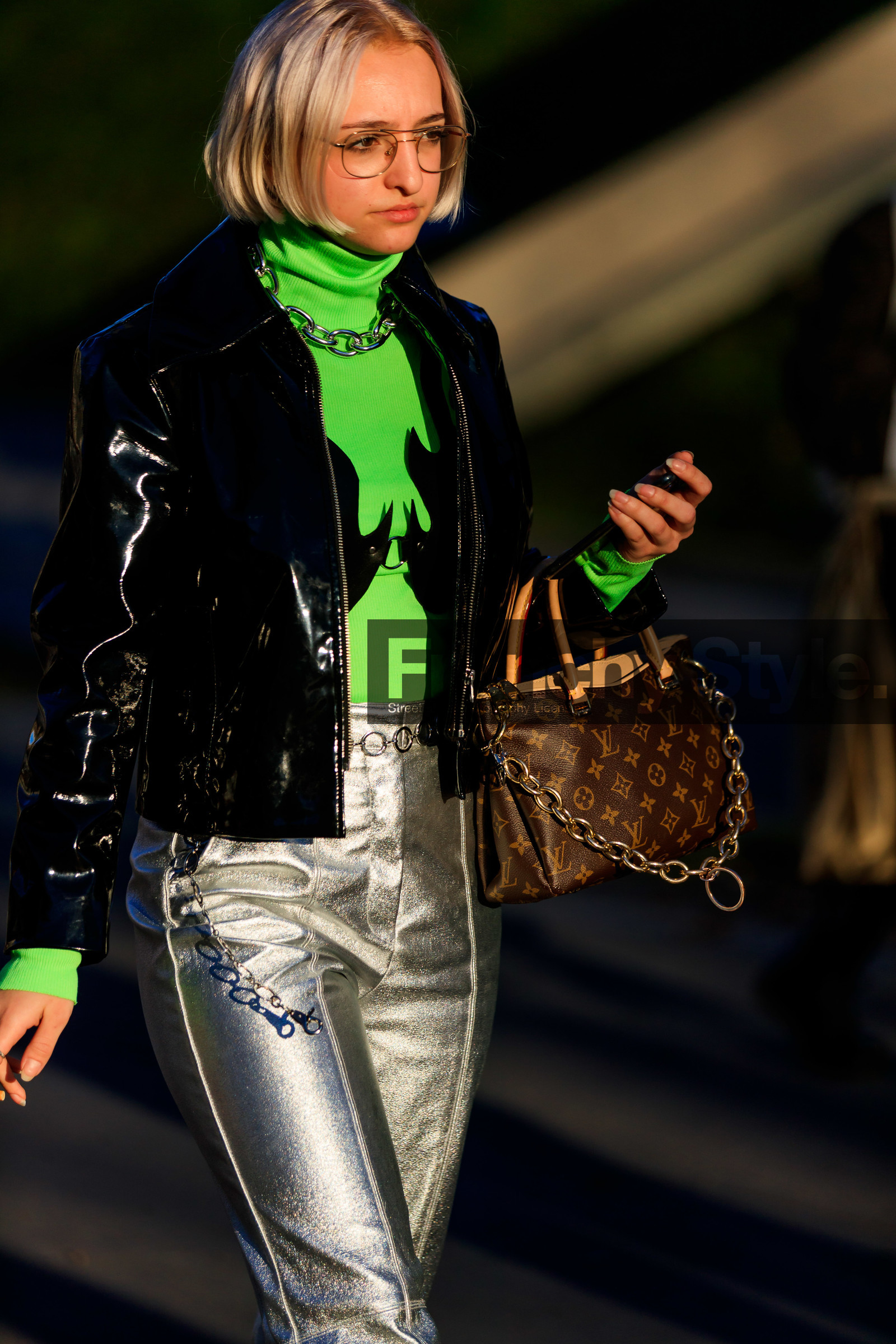 black jacket, brown bag, chains, graphic bag, green sweater, leather bag, leather pants, louis vuitton, monogram, necklace, neon, printed bag, shiny pants, silver pants, trousers, vinyl, PARIS, PFW, street style, jonathan paciullo, FW, frenchystyle, fashion week, AUTUMN WINTER 2019-2020, AW 19-20, FALL WINTER 2019-2020, FW 19-20, vertical, atmosphere details, detail