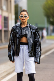 bermuda, black crop top, black jacket, black legging, crop top, jacket, jogging short, Karina Nigay, legging, sport look, sunglasses, vinyl jacket, white bermuda, white sunglasses, fashion week, frenchystyle, FW, jonathan paciullo, street style, SPRING SUMMER 2022, SS 22, MFW, MILAN, vertical, atmosphere details