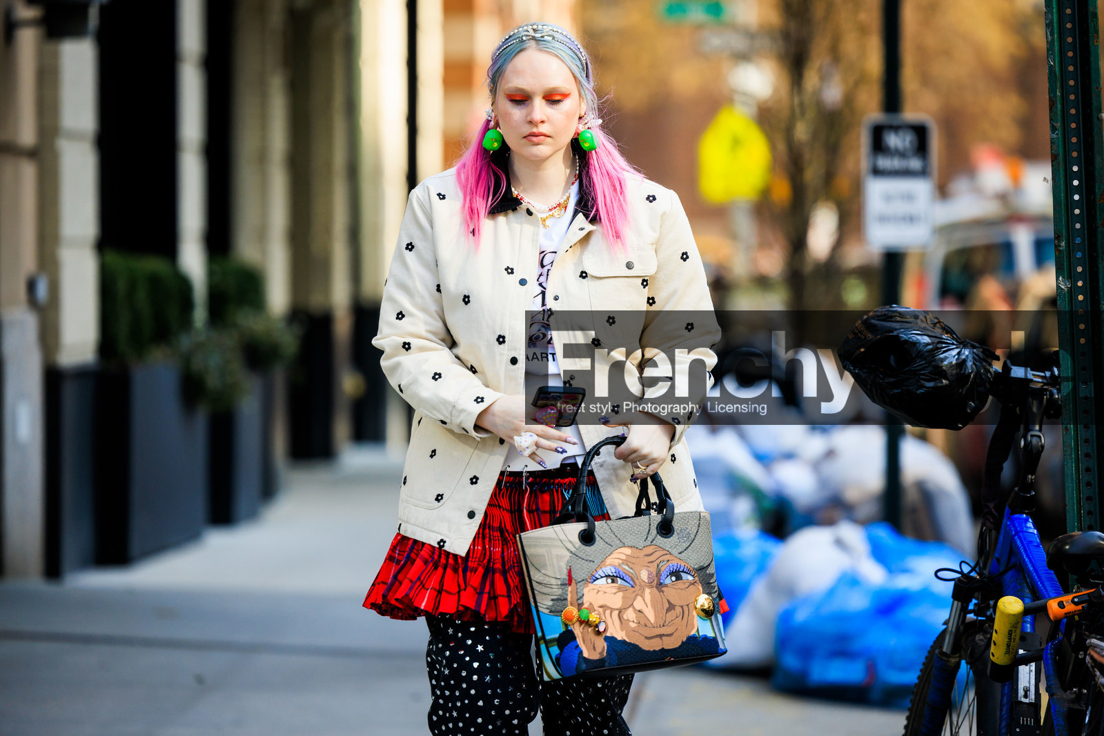 multicolor prints, printed white and black flowers jacket, pink piggy tails, green earrings, printed tshirt, red pleated plaid red and black skirt, black trousers with white dotts, printed manga tote bag, silver tiara, kristen bateman, fashion week, frenchystyle, FW, jonathan paciullo, street style, NYFW, NEW YORK, AUTUMN WINTER 2022-2023, FALL WINTER 2022_2023, FW 22-23, atmosphere details, horizontal