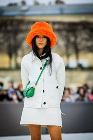 orange hat, fluffy hat, furry hat, dior, mini dior bag, green bag, white look, mini skirt, buttoned jacket, yoyo cao, fashion week, frenchystyle, FW, jonathan paciullo, street style, AUTUMN WINTER 2022-2023, FALL WINTER 2022_2023, FW 22-23, PFW, PARIS, vertical, detail