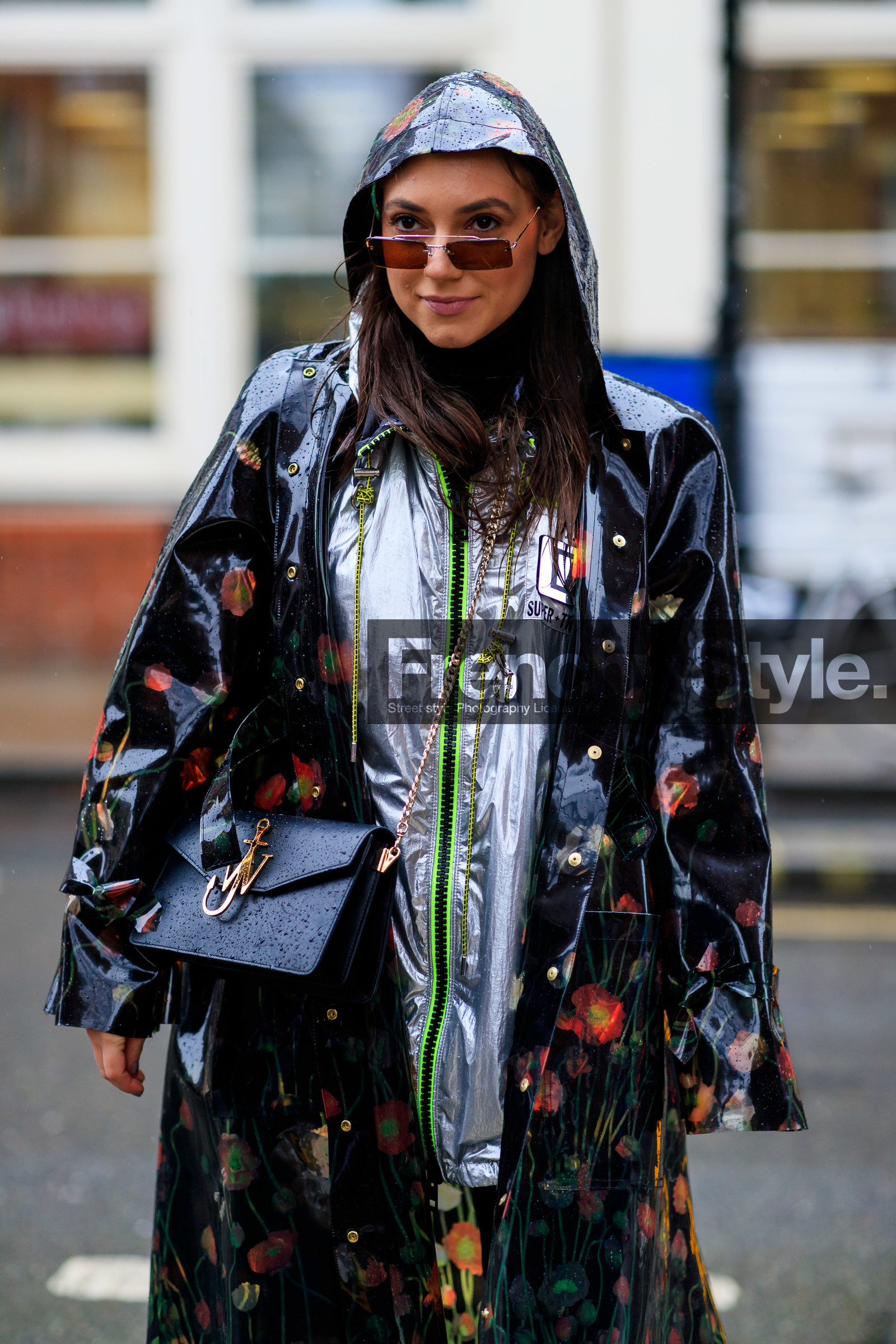 black bag, black coat, floral, flowers, graphic jacket, hood, jw anderson, leather bag, printed jacket, rain coat, silver jacket, sunglasses, LONDON, LFW, fashion week, frenchystyle, FW, jonathan paciullo, street style, AUTUMN WINTER 2019-2020, AW 19-20, FW 19-20, FALL WINTER 2019-2020, vertical, atmosphere details, detail