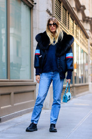 black jacket, black shoes, black sneakers, blue bag, blue denim, denim pants, fur collar, graphic bag, graphic jacket, jeans, leather bag, leather shoes, navy sweater, printed bag, printed jacket, red socks, sunglasses, trousers, turquoise, street style, jonathan paciullo, FW, frenchystyle, fashion week, NYFW, NEW YORK, AUTUMN WINTER 2018-2019, AW 18-19, FALL WINTER 2018-2019, FW 18-19, vertical, full length, veronika heilbrunner