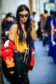 ufo sunglasses, black sunglasses, orange corset, corset top, black trousers, multicolor jacket, race jacket, red jacket, close up, street style, jonathan paciullo, FW, frenchystyle, fashion week, AUTUMN WINTER 2022-2023, FALL WINTER 2022_2023, FW 22-23, PARIS, PFW, vertical, detail