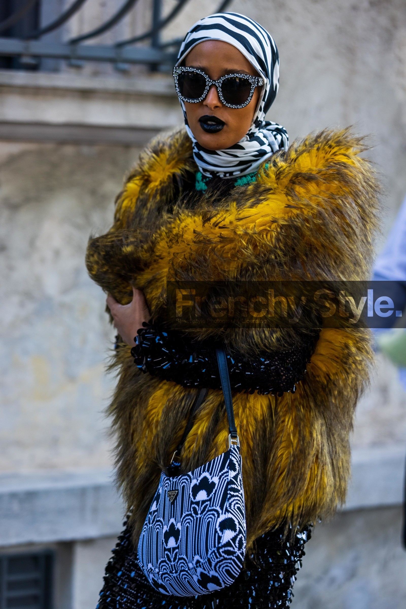 bicolor bag, black and white, black dress, black lipstick, fur coat, hijab, jacquard, prada bag, prada look, print, printed bag, printed scarf, scarf, sequin, strass, stripes, sunglasses, yellow fur coat, fashion week, frenchystyle, FW, jonathan paciullo, street style, SPRING SUMMER 2022, SS 22, MFW, MILAN, vertical, atmosphere details
