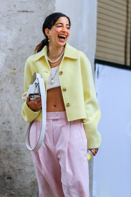 light yellow jacket, yellow jacket, white top, asymmetrical top, cropped top, light pink pants, pink pants, oversize pants, carrot pants, low waist pants, golden necklace, golden earrings, multi necklace, multi earrings, medal necklace, pearl necklace, white leather bag, acne studios bag, selma kaci, fashion week, frenchystyle, FW, jonathan paciullo, street style, PFW, PARIS, SPRING SUMMER 2022, SS 22, vertical, atmosphere details, detail