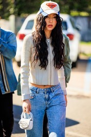 diesel logo cap, white cap, wavy hair, silver cardigan, pleated zipped cardigan, classic jeans, diesel jeans, mini diesel bag, fashion week, frenchystyle, FW, jonathan paciullo, street style, MFW, MILAN, FALL WINTER 2022_2023, AUTUMN WINTER 2022-2023, FW 22-23, vertical, full length