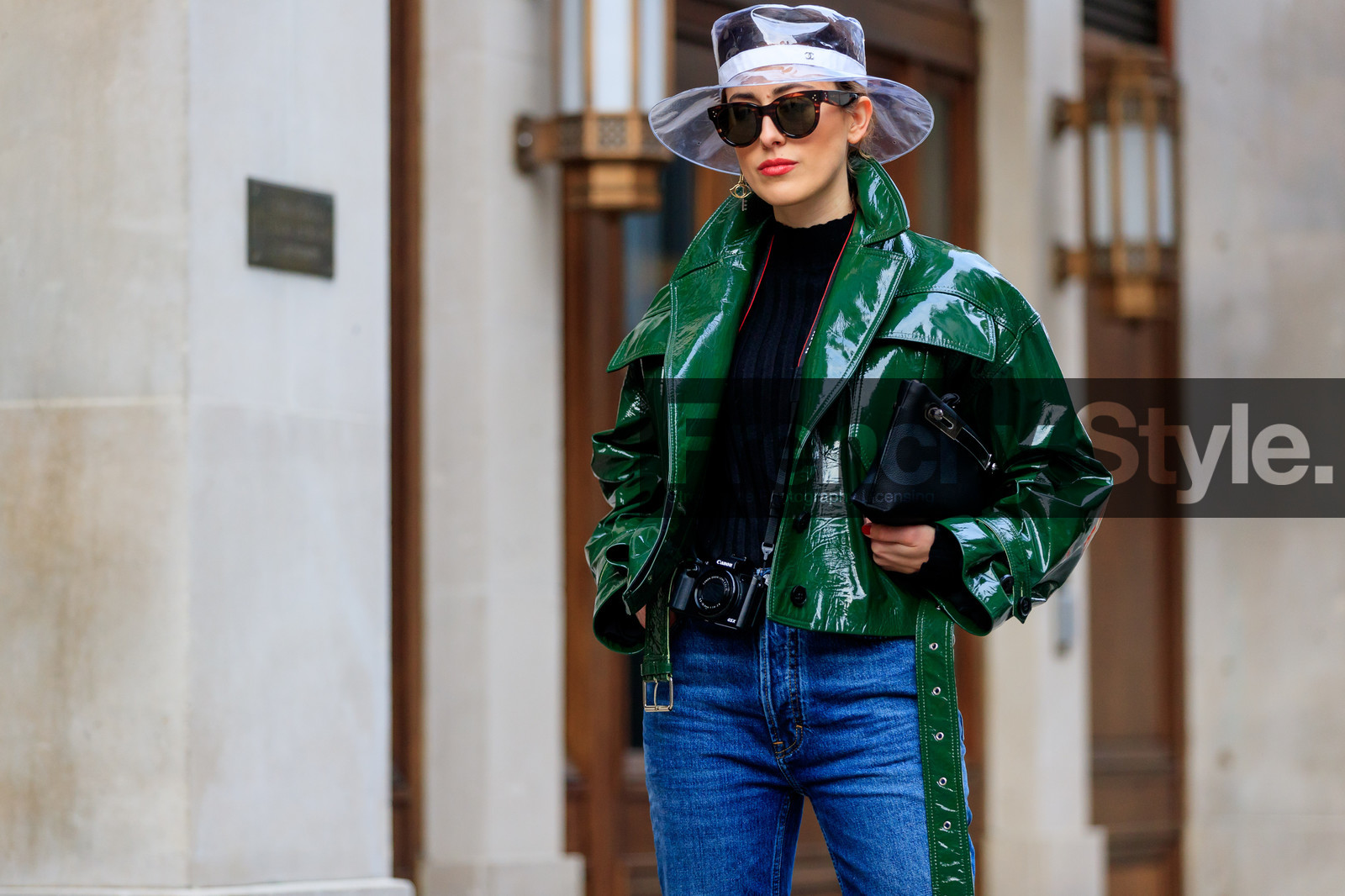 black bag, black sweater, blue denim, camera, chanel, denim pants, green jacket, hermès, jeans, leather bag, leather jacket, leather perfecto, sunglasses, transparent hat, trousers, street style, jonathan paciullo, FW, frenchystyle, fashion week, LFW, LONDON, AUTUMN WINTER 2018-2019, AW 18-19, FALL WINTER 2018-2019, FW 18-19, horizontal, atmosphere details, detail, sylvia haghjoo