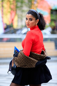 ola farahat, red pullover, turtleneck pullover, black skirt, black bombers, brown bombers, monogrammed bombers, logo earrings, round shape earrings, golden earrings, black headband, leather head band, monogrammed head band, louis vuitton jacket, louis vuitton earrings, louis vuitton head band, PARIS, PFW, fashion week, frenchystyle, FW, jonathan paciullo, street style, SPRING SUMMER 2021, SS 21, vertical, atmosphere details, detail