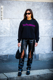 black sunglasses, black sweatshirt, black leather pants, black leather boots, split pants, letter printed pants, black bag, prada bag, hand bag, street style, jonathan paciullo, FW, frenchystyle, fashion week, MFW, MILAN, SPRING SUMMER 2021, SS 21, vertical, full length
