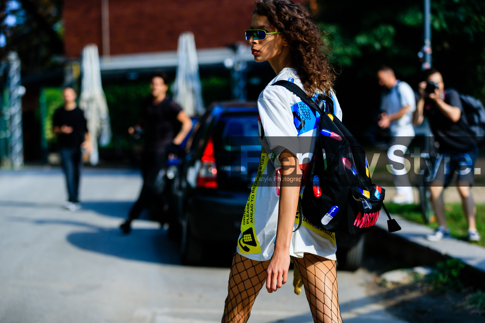 alice metza, atmosphere details, back detail, backpack, black bag, detail, fashion week, fishnet, frenchystyle, FW, graphic top, horizontal, jonathan paciullo, leather bag, MFW, MILAN, model, moschino, printed t shirt, SPRING SUMMER 2017, SS 17, street style, sunglasses, t shirt dress, tights, white t shirt