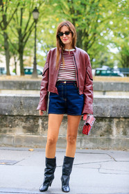 gala gonzalez, burgundy leather jacket, burgundy pullover, white pullover, striped pullover, red leather bag, valentino bag, denim shorts, navy blue shorts, high waist shorts, studs details bag, strassed bag, small sunglasses, scale sunglasses, black leather boots, valentino look, valentino pullover, valentino shorts, PARIS, PFW, SPRING SUMMER 2020, SS 20, fashion week, frenchystyle, FW, jonathan paciullo, street style, vertical, full length