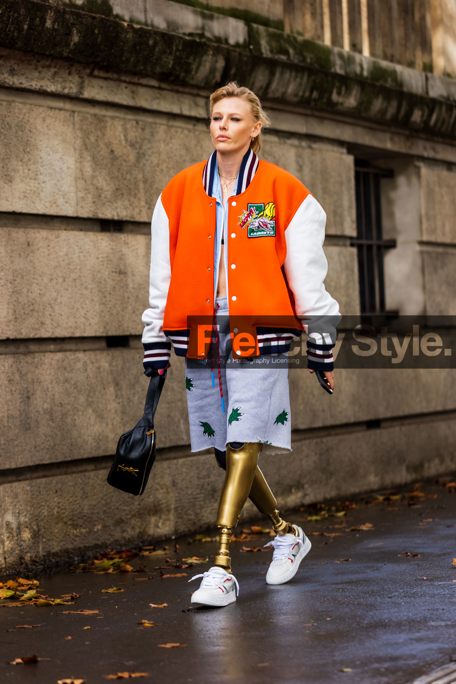 bag, beltbag, black bag, bomber, color, grey shorts, jogging, lacoste look, Lauren Wasser, orange bomber, shorts, sneakers, stripes, white sneakers, lacoste, fashion week, frenchystyle, FW, jonathan paciullo, street style, PFW, PARIS, SPRING SUMMER 2022, SS 22, vertical, full length