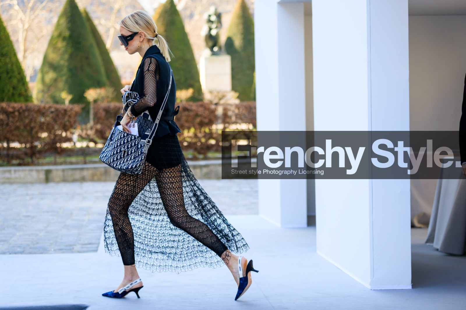 black and white bag, black and white shoes, black dress, black jacket, black shoes, black top, christian dior, fishnet, graphic bag, graphic dress, high heels, leather bag, leather shoes, leonie hanne, printed bag, printed dress, saddle bag, see through, sleeveless, sunglasses, tights, PARIS, PFW, street style, jonathan paciullo, FW, frenchystyle, fashion week, AUTUMN WINTER 2019-2020, AW 19-20, FALL WINTER 2019-2020, FW 19-20, horizontal, atmosphere details, full length