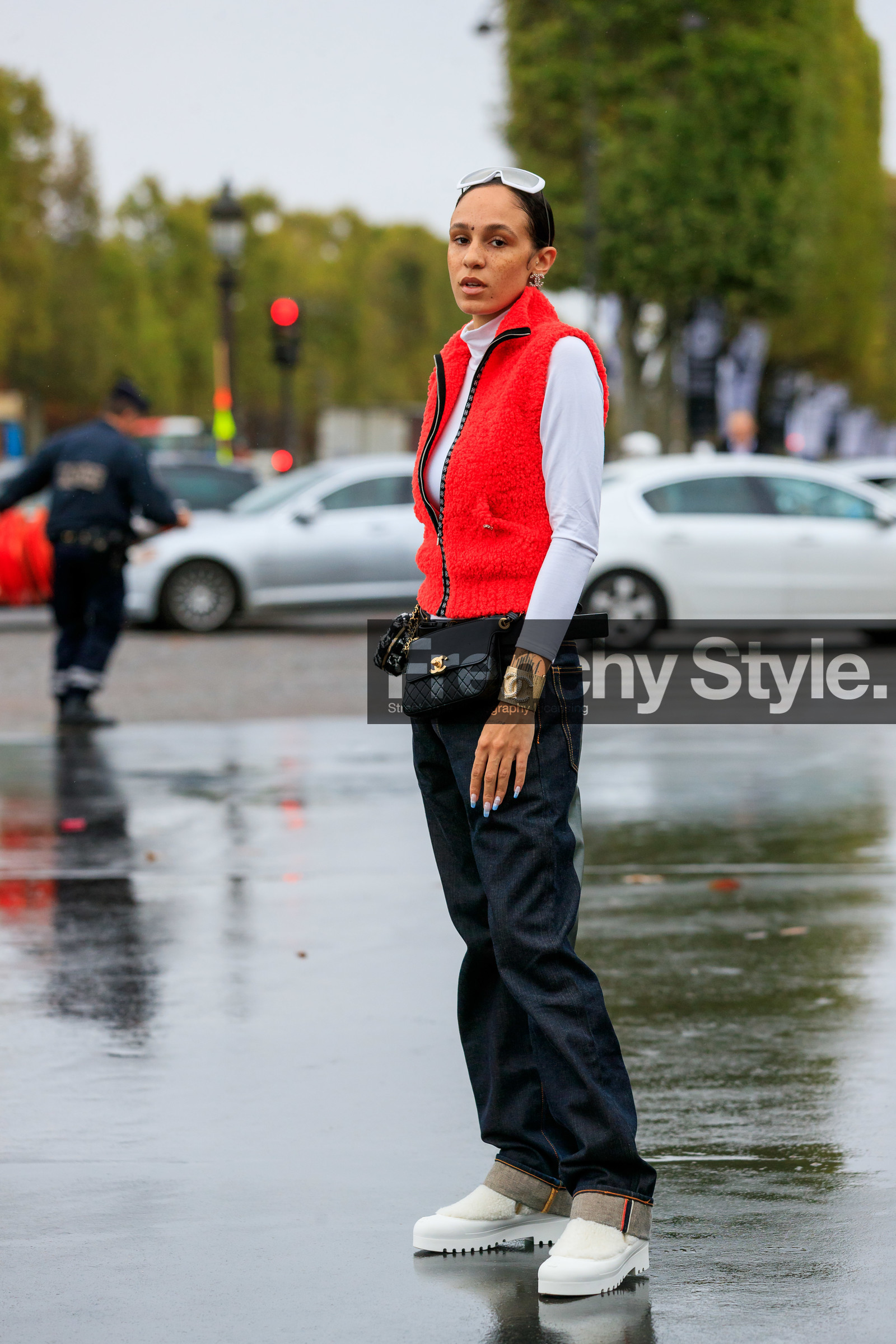 hera pradel, red jacket, chanel jacket, chanel bag, chanel belt, chanel earrings, chanel bracelet, nails details, nail art, blue jeans, denim, white top, fur jacket, sleeveless jacket, zipped jacket, quilted bag, quilted belt, black leather bag, black leather belt, belt bag, round shape bag, houndstooth printed bag, golden bracelet, big bangle, big bracelet, strassed bangle, strassed bracelet, turtleneck top, white sunglasses, mirror sunglasses, big sunglasses, futurist shape sunglasses, white boots, fur boots, flat boots, big sole boots, PARIS, PFW, SPRING SUMMER 2020, SS 20, fashion week, frenchystyle, FW, jonathan paciullo, street style, vertical, full length