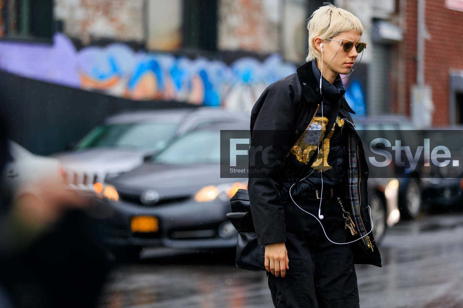 black bag, black jacket, black pants, down jacket, embroidered jacket, headphones, leather bag, rain jacket, sunglasses, trousers, street style, jonathan paciullo, FW, frenchystyle, fashion week, NYFW, NEW YORK, AUTUMN WINTER 2018-2019, AW 18-19, FALL WINTER 2018-2019, FW 18-19, atmosphere details, horizontal, detail