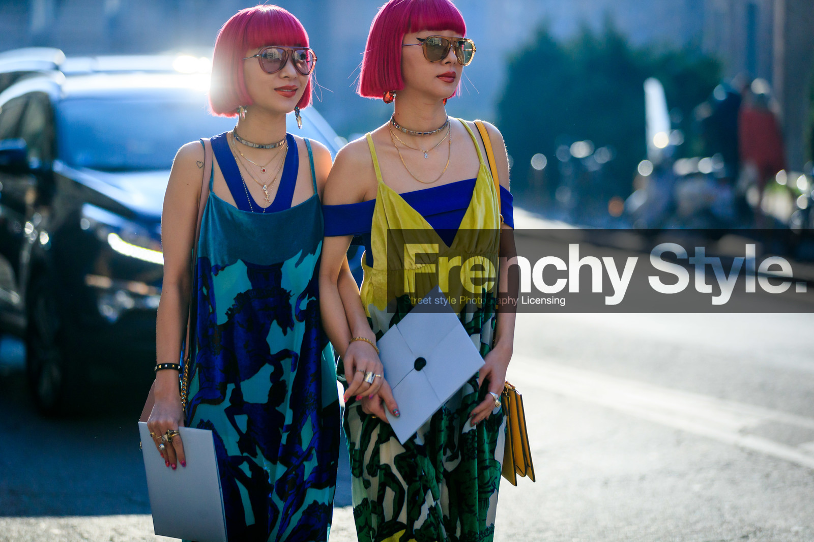 Ami and Aya Suzuki, ferragamo bag, yellow dress, light blue dress, sleeveless dress, half shoulder dress, long dress, animal print dress, printed dress, green dress, bicolor dress, yellow leather bag, shoulder bag, golden strap bag, nude leather bag, pink hair, dyed hair, aviator sunglasses, pink sunglasses, yellow sunglasses, silvered choker, golden earrings, multi necklace, strassed earrings, dangling earrings, low necked dress, fashion week, frenchystyle, FW, jonathan paciullo, street style, MFW, MILAN, AUTUMN WINTER 2020-2021, FALL WINTER 2020-2021, FW 20-21, horizontal, atmosphere details, detail