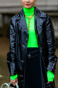 neon green pullover, turtleneck pullover, black polish trench coat, black skirt, golden earrings, golden necklace, margiela necklace, margiela earrings, margiela boots, close up detail, fashion week, frenchystyle, FW, jonathan paciullo, street style, SPRING SUMMER 2020, SS 20, PFW, PARIS, vertical, atmosphere details, detail
