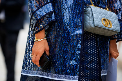 dior bag, logo all over, dior bracelet, cartier bracelet, cartier clou bracelet, cartier ring, golden bracelet, golden ring, pearl bracelet, initials bracelet, close up detail, jewel close up, bag detail, light blue bag, light blue leather bag, quilted bag, blue bag, blue leather bag, chain strap bag, caro dior bag, sheer trench coat, monogrammed trench coat, monogrammed parka, monogrammed coat, tamara kalinic, fashion week, frenchystyle, FW, jonathan paciullo, street style, PFW, PARIS, AUTUMN WINTER 2021-2022, FALL WINTER 2021-2022, FW 21-22, atmosphere details, horizontal, detail