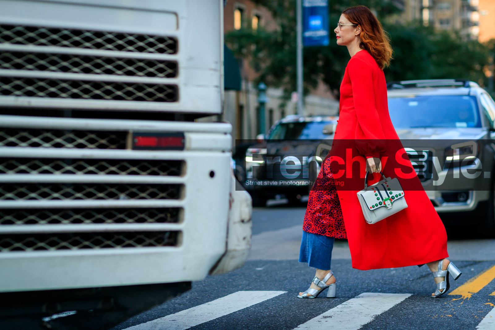 atmosphere details, blue denim, christene barberich, denim pants, fashion week, frenchystyle, full length, FW, graphic bag, high heels, horizontal, jeans, jonathan paciullo, leather bag, leather shoes, NEW YORK, NYFW, red coat, silver shoes, SPRING SUMMER 2018, SS 18, street style, trousers, white bag