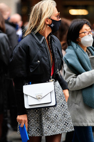black bombers, black skirt, white skirt, white leather bag, zipped jacket, cropped bombers, monogrammed skirt, crossbody bag, louis vuitton bag, louis vuitton jacket, louis vuitton skirt, covid face mask, louis vuitton, monogramme, PARIS, PFW, fashion week, frenchystyle, FW, jonathan paciullo, street style, SPRING SUMMER 2021, SS 21, vertical, atmosphere details, detail