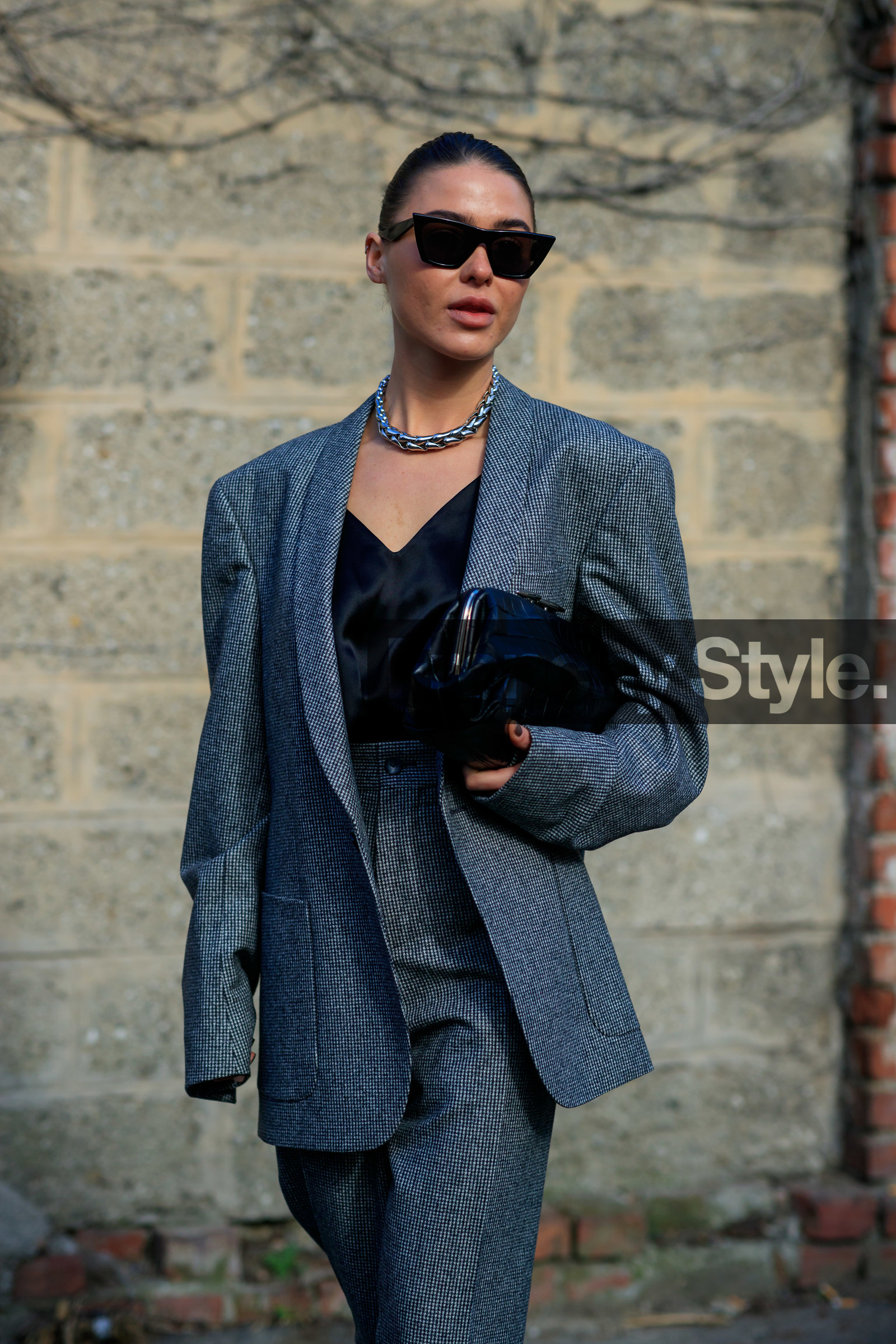 sophia roe, black jacket, black pants, black sunglasses, black top, black leather clutch, satin top, low necked top, oversize jacket, houndstooth printed jacket, houndstooth printed pants, animal skin clutch, celine sunglasses, butterfly sunglasses, futurist shape sunglasses, silvered necklace, big necklace, fashion week, frenchystyle, FW, jonathan paciullo, street style, MFW, MILAN, AUTUMN WINTER 2020-2021, FALL WINTER 2020-2021, FW 20-21, vertical, atmosphere details, detail