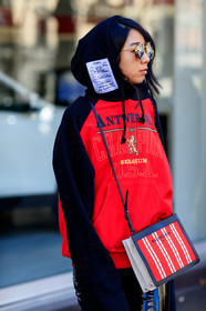 AUTUMN WINTER 2017-2018, AW 17-18, balenciaga, black pants, detail, FALL WINTER 2017-2018, fashion week, frenchystyle, FW, FW 17-18, hood, hoodie, jonathan paciullo, leather bag, leather pants, MFW, MILAN, printed bag, red bag, red sweater, street style, striped bag, sunglasses, trousers, vertical, vêtements