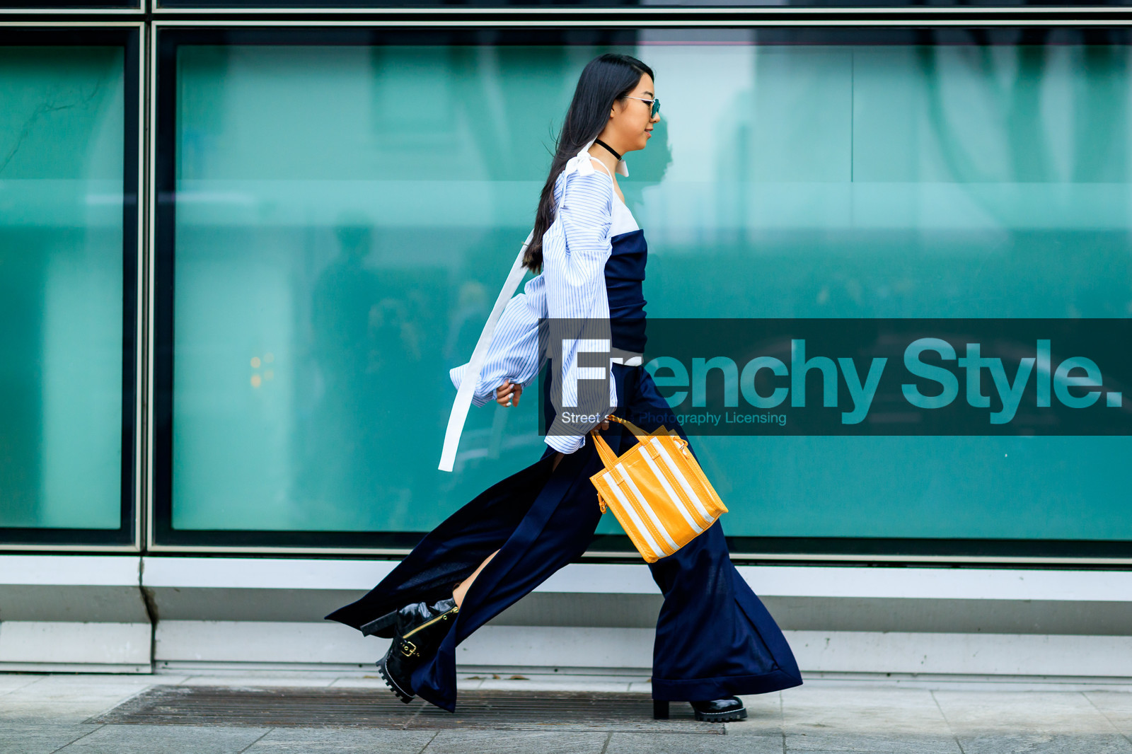 atmosphere details, AUTUMN WINTER 2017-2018, AW 17-18, balenciaga, black boots, black shoes, blue shirt, bustier top, choker, FALL WINTER 2017-2018, fashion week, frenchystyle, full length, FW, FW 17-18, graphic bag, horizontal, jonathan paciullo, leather bag, leather shoes, MFW, MILAN, navy pants, necklace, off the shoulder, printed bag, street style, striped bag, sunglasses, trousers, wide pants, yellow bag