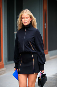 josefine H.J, louis vuitton skirt, louis vuitton jacket, louis vuitton bag, louis vuitton clutch, black jacket, black skirt, black hoodie, zipped jacket, zipped hoodie, zipped skirt, black leather bag, hand bag, blue leather clutch, hoop earrings, golden earrings, multi earrings, sportswear, sportswear jacket, PARIS, PFW, fashion week, frenchystyle, FW, jonathan paciullo, street style, SPRING SUMMER 2021, SS 21, vertical, atmosphere details, detail