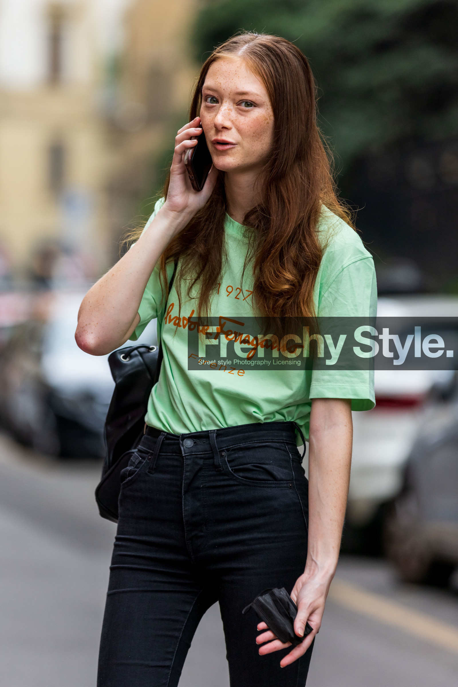 bag, black bag, black denim, black jean, color, denim, fluo green, freckles, green t-shirt, jean, logo t-shirt, red hair, Sara Grace Wallestedt, skinny jean, smartphone, t-shirt, fashion week, frenchystyle, FW, jonathan paciullo, street style, SPRING SUMMER 2022, SS 22, MFW, MILAN, vertical, atmosphere details