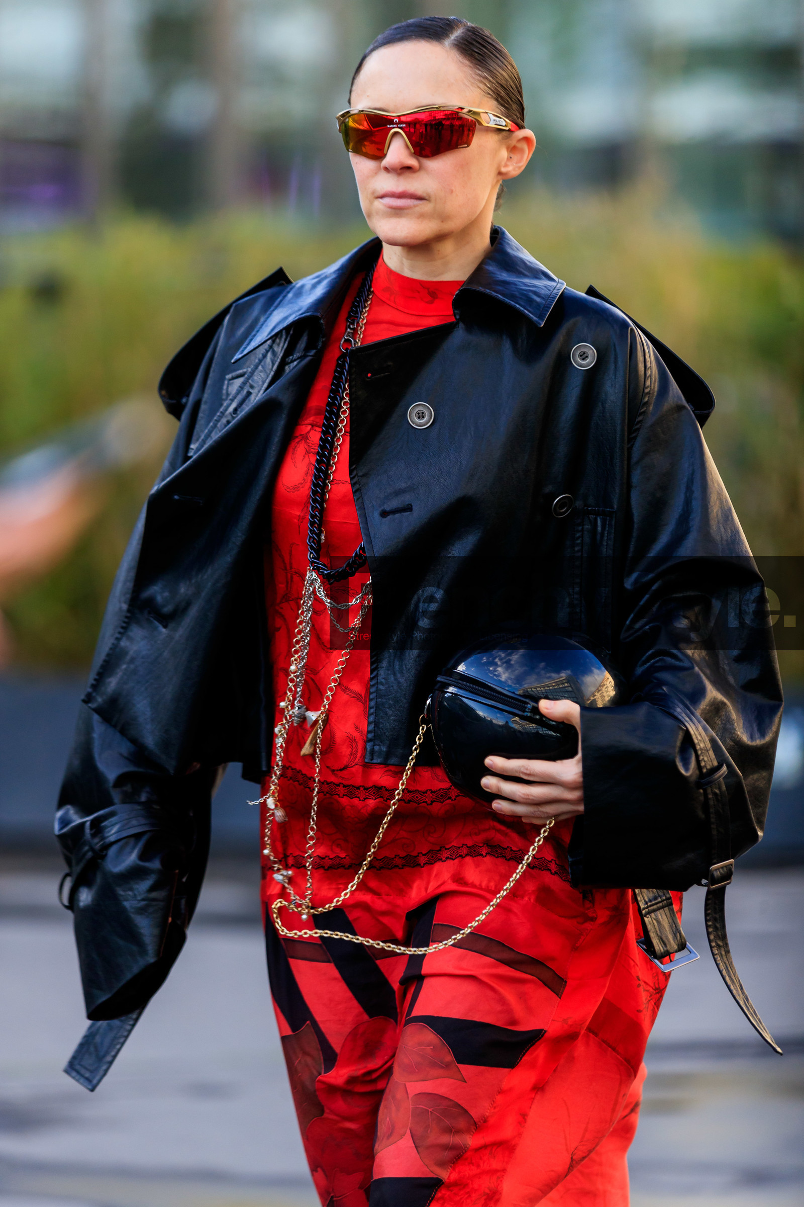 black leather jacket, red dress, floral printed dress, long dress, black vinyl bag, round shape bag, long necklace, red sunglasses, mirror sunglasses, futurist shape sunglasses, marine serre bag, marine serre dress, marine serre sunglasses, silvered necklace, black necklace, big chain necklace, shell necklace, charms necklace, fashion week, frenchystyle, FW, jonathan paciullo, street style, PFW, PARIS, AUTUMN WINTER 2020-2021, FALL WINTER 2020-2021, FW 20-21, vertical, atmosphere details, detail