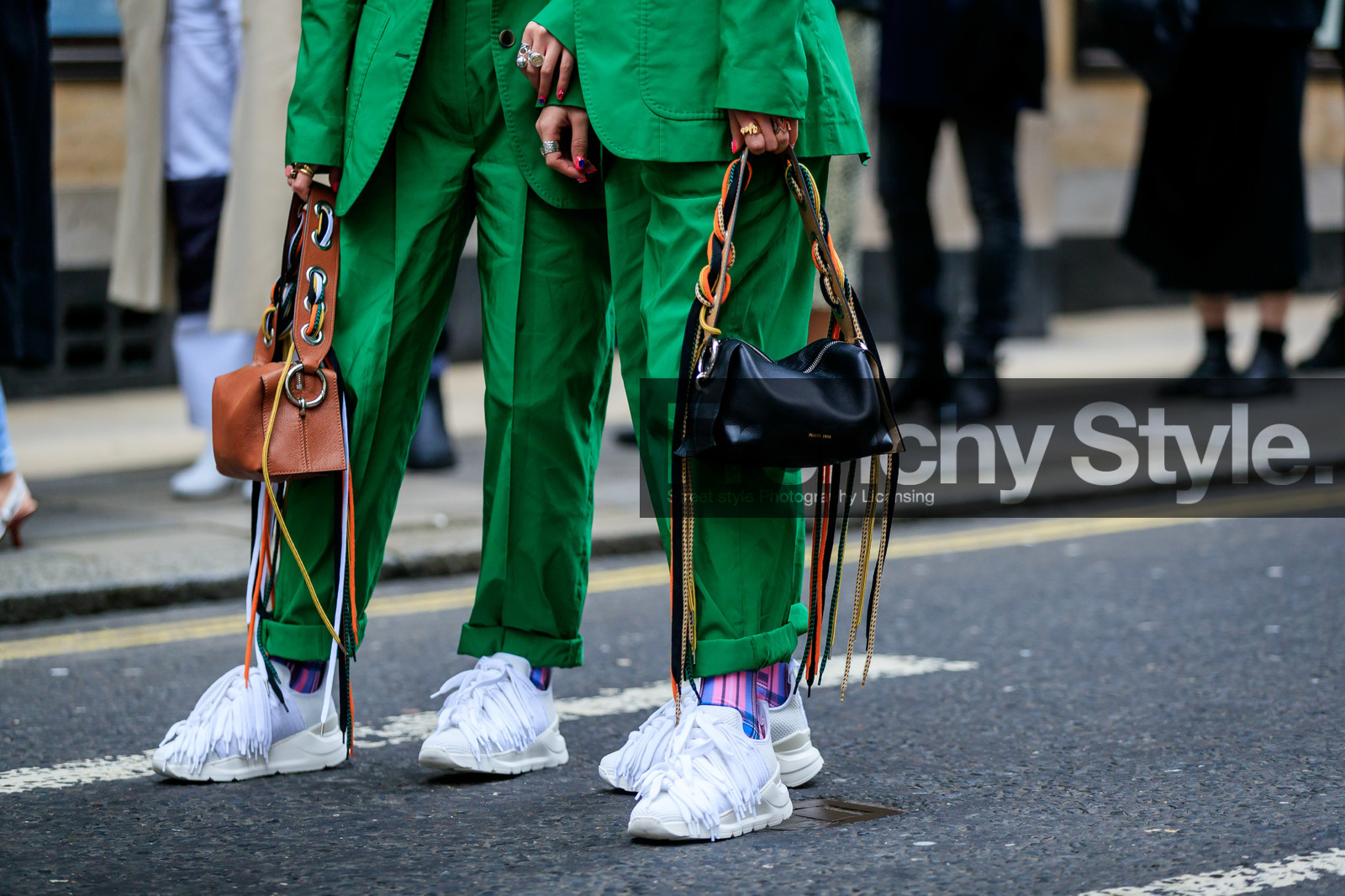 Ami and Aya Suzuki, black bag, camel bag, fringes, green jacket, green pants, green suit, leather bag, leather shoes, ports 1961, trousers, white sneakers, street style, jonathan paciullo, FW, frenchystyle, fashion week, LFW, LONDON, AUTUMN WINTER 2019-2020, AW 19-20, FW 19-20, FALL WINTER 2019-2020, horizontal, atmosphere details, detail