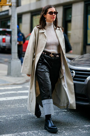 black leather pants, light beige trench coat, white top, sheer top, high collar top, pleated top, belted pants, patchwork belt, animal skin belt, fur belt, scale sunglasses, brown leather belt, denim, blue jeans, black leather boots, chelsea boots, flat boots, silvered earrings, dangling earrings, hair clip, fashion week, frenchystyle, FW, jonathan paciullo, street style, NYFW, NEW YORK, AUTUMN WINTER 2020-2021, FALL WINTER 2020-2021, FW 20-21, vertical, full length