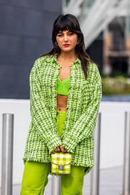checked bag, checked shirt, color, fluo color, green bra, green monochrome, green pants, knitted bra, leather bag, leather pants, Maria Bernad, monochrome, msmg look, print, printed bag, printed shirt, yellow bag, fashion week, frenchystyle, FW, jonathan paciullo, street style, SPRING SUMMER 2022, SS 22, MFW, MILAN, vertical, atmosphere details