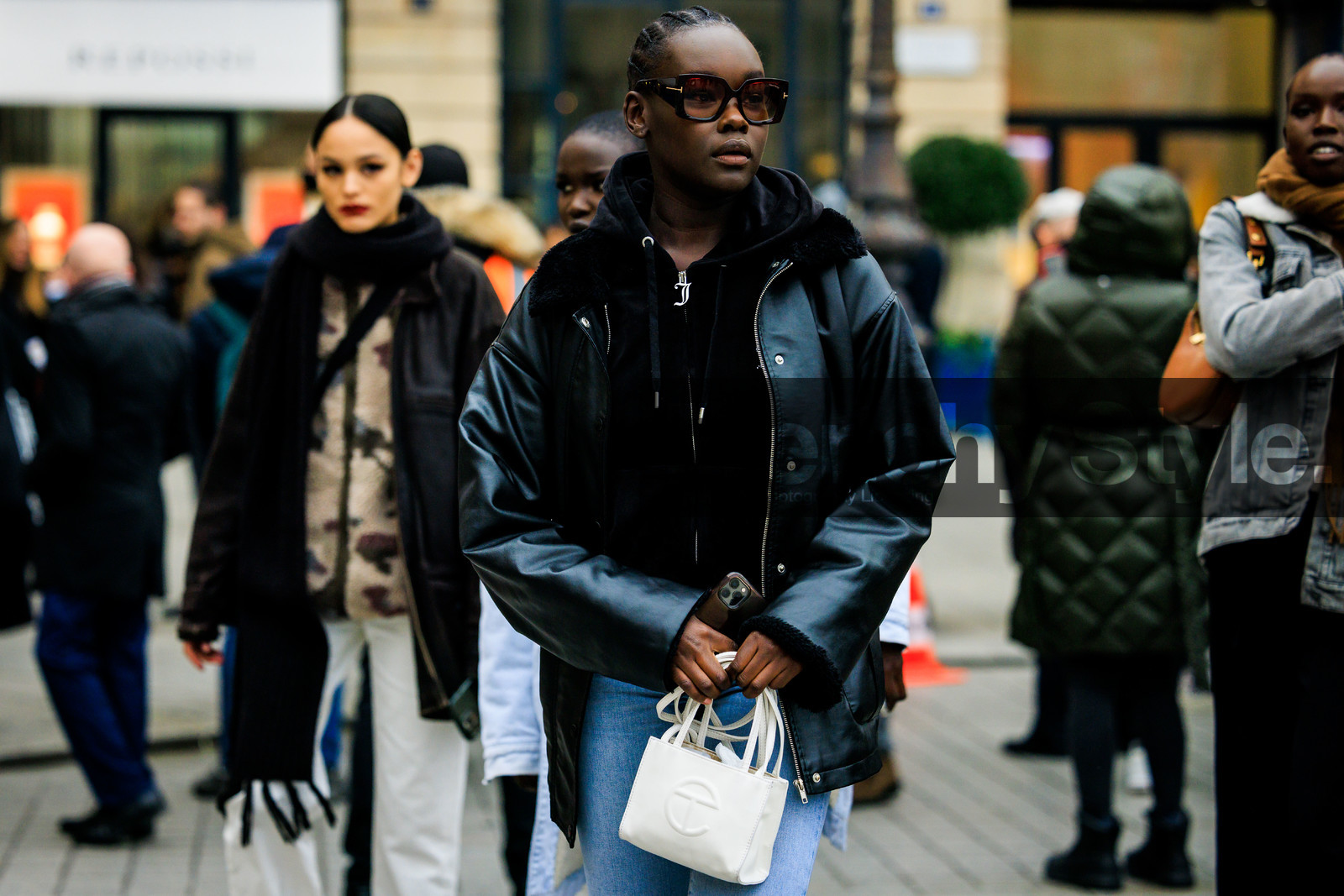 black sunglasses, black jacket, leather jacket, black hoodie, classic jeans, telfar bag, mini bag, white bag, fashion week, frenchystyle, FW, jonathan paciullo, street style, PARIS, PFW, SPRING SUMMER 2022, SS 22, atmosphere details, detail, horizontal, model