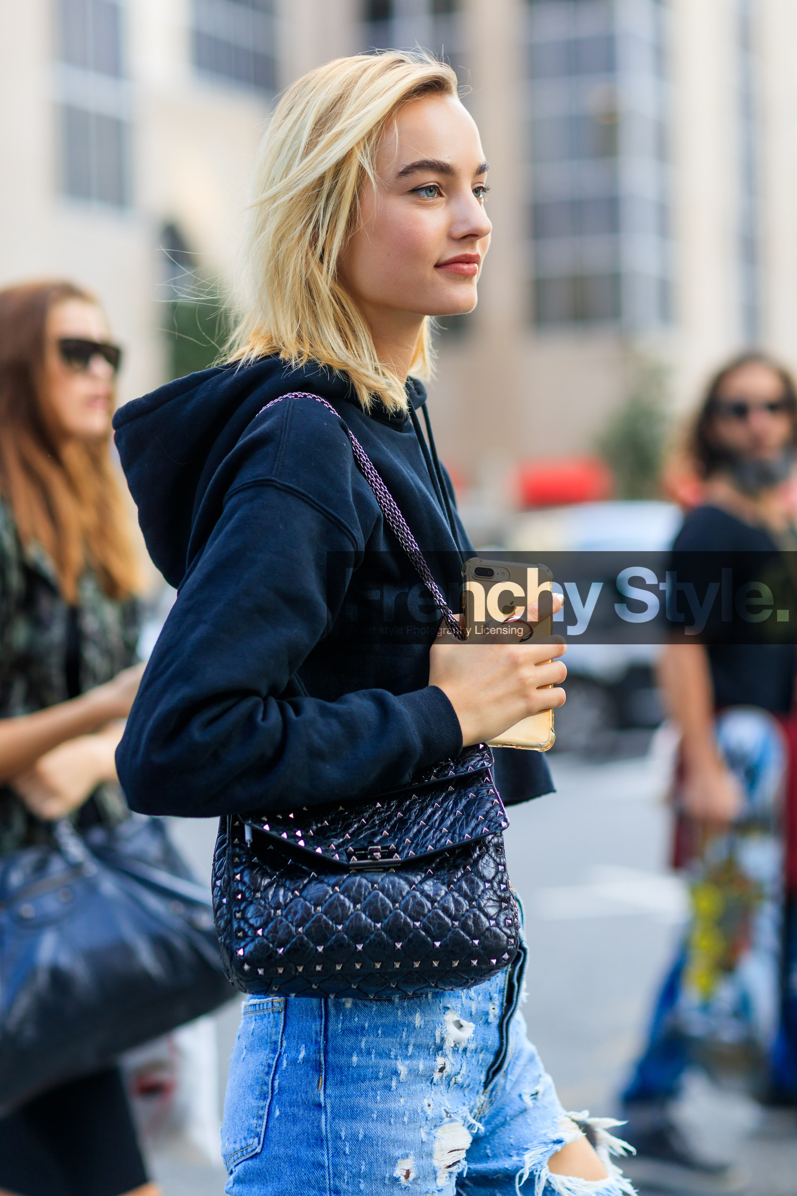 atmosphere details, black bag, black sweater, blue denim, chanel, denim pants, detail, fashion week, frenchystyle, FW, hoodie, iphone, jeans, jonathan paciullo, leather bag, Maartje Verhoef, model, NEW YORK, NYFW, ripped pants, SPRING SUMMER 2018, SS 18, street style, trousers, vertical