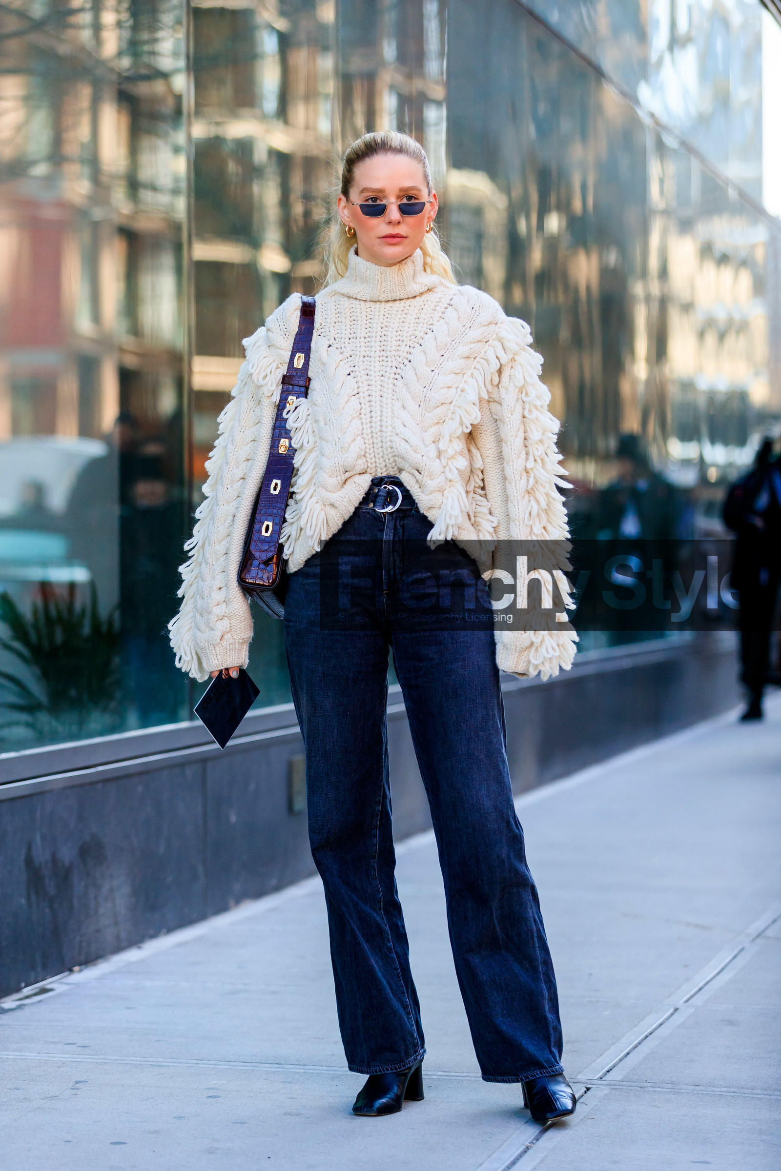 megane, megan adelaide, white pullover, oversize pullover, fringe pullover, small sunglasses, mirror sunglasses, metalic frame sunglasses, turtleneck pullover, black jeans, belted pants, brown leather bag, shoulder bag, animal skin bag, multi bucke bag, flare jeans, black leather boots, fashion week, frenchystyle, FW, jonathan paciullo, street style, AUTUMN WINTER 2020-2021, FALL WINTER 2020-2021, FW 20-21, vertical, full length, NYFW, NEW YORK