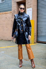 brittany xavier, black polish parka, vinyl jacket, vinyl trenchcoat, coach coat, coach bag, camel leather pants, camel leather boots, cropped pants, animal skin boots, black leather bag, monogrammed bag, shoulder bag, black sunglasses, hoop earrings, golden earrings, fashion week, frenchystyle, FW, jonathan paciullo, street style, NYFW, NEW YORK, AUTUMN WINTER 2020-2021, FALL WINTER 2020-2021, FW 20-21, vertical, full length