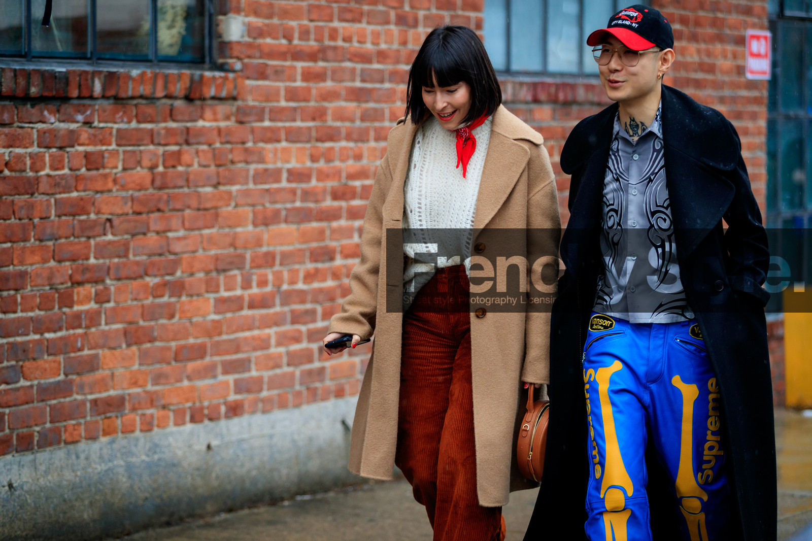 beige coat, black cap, black coat, blue pants, brown bag, brown pants, camel coat, corduroy, graphic bag, graphic pants, grey shirt, leather bag, leather pants, printed pants, printed shirt, red bandana, supreme, tattoos, trousers, white sweater, yellow, street style, jonathan paciullo, FW, frenchystyle, fashion week, NYFW, NEW YORK, AUTUMN WINTER 2018-2019, AW 18-19, FALL WINTER 2018-2019, FW 18-19, atmosphere details, horizontal, detail