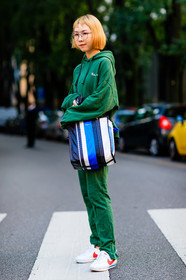 balenciaga, blue bag, fashion week, frenchystyle, full length, FW, graphic bag, green pants, green sweater, hoodie, jonathan paciullo, leather bag, leather shoes, MFW, MILAN, nike, SPRING SUMMER 2017, SS 17, street style, striped bag, trousers, vertical, vêtements, white sneakers
