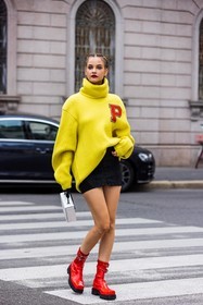 badge, bag, Barbara Palvin, black skirt, bread hairstyle, color, denim skirt, hairstyle, knit, knitwear, lace up skirt, mini skirt, oversize knit, oversize turtleneck, red lips, ribbed knit, ribbed turtleneck, skirt, white bag, yellow knit, yellow turtleneck, red boots, boots, leather boots, philosophy look, fashion week, frenchystyle, FW, jonathan paciullo, street style, SPRING SUMMER 2022, SS 22, MFW, MILAN, vertical, full length