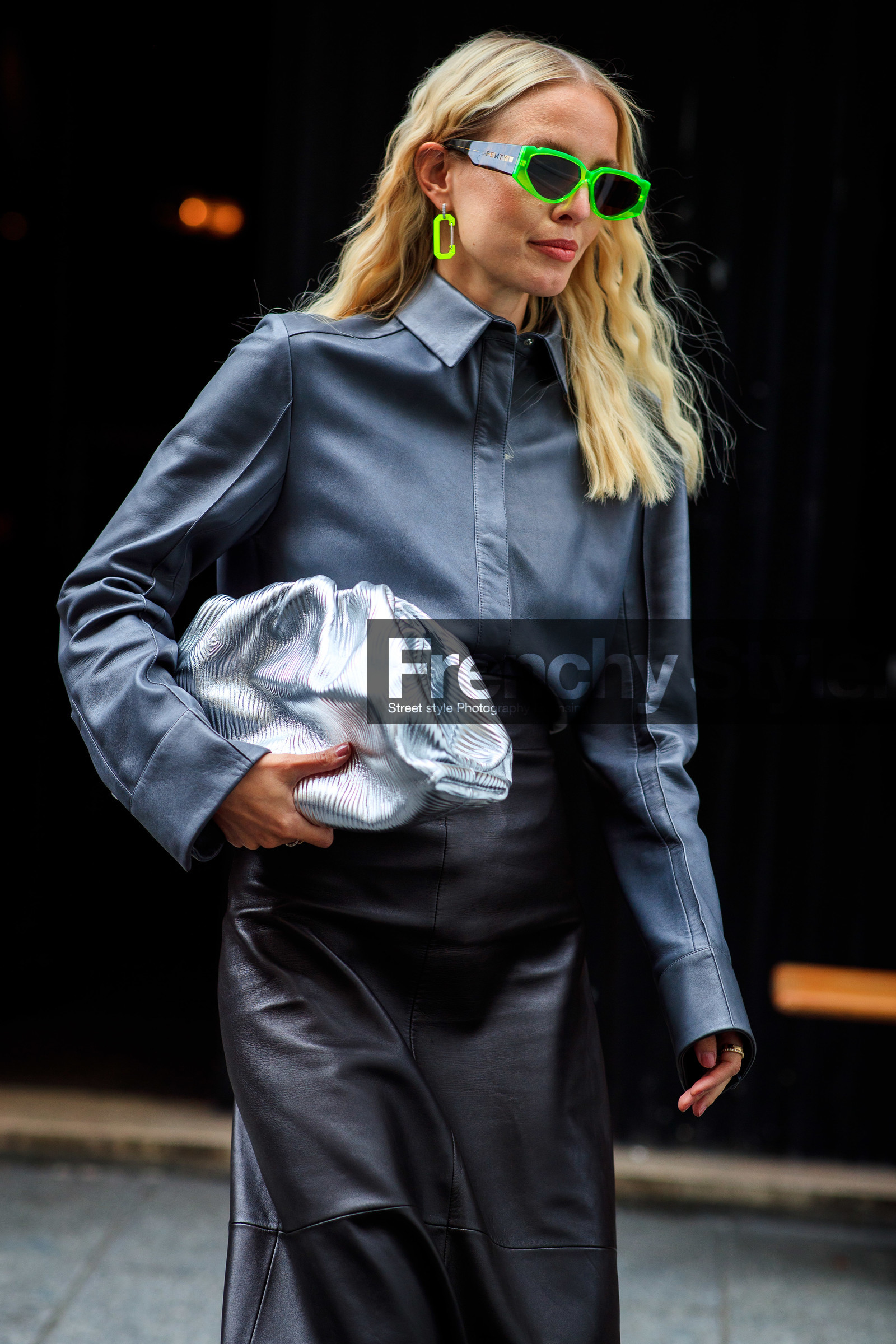 leonie hanne, black leather skirt, grey leather shirt, silver clutch, bottega veneta bag, neon green sunglasses, scale sunglasses, futurist shape sunglasses, fenty sunglasses, neon green earrings, round shape earrings, dangling earrings, long skirt, fashion week, frenchystyle, FW, jonathan paciullo, street style, PFW, PARIS, SPRING SUMMER 2021, SS 21, vertical, atmosphere details, detail