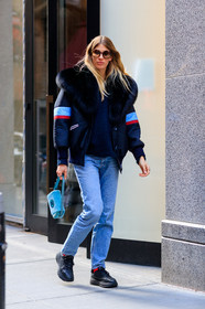 black jacket, black shoes, black sneakers, blue bag, blue denim, denim pants, fur collar, graphic bag, graphic jacket, jeans, leather bag, leather shoes, navy sweater, printed bag, printed jacket, red socks, sunglasses, trousers, turquoise, street style, jonathan paciullo, FW, frenchystyle, fashion week, NYFW, NEW YORK, AUTUMN WINTER 2018-2019, AW 18-19, FALL WINTER 2018-2019, FW 18-19, vertical, full length, veronika heilbrunner